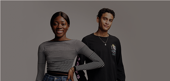 Image of 2 students smiling at the camera