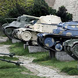 a truck is parked on the side of a river
