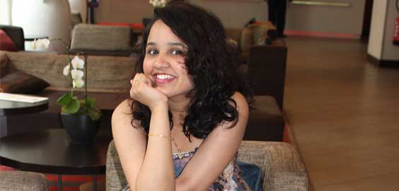 a woman sitting in a room