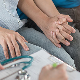 Couple holding hands