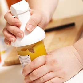 a hand holding a baby