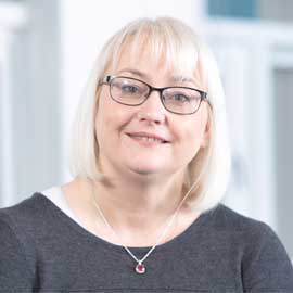 a woman smiling for the camera