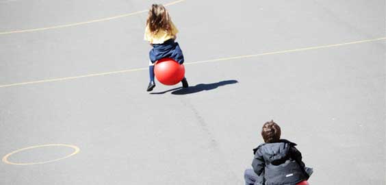 a person hitting a ball with a racket