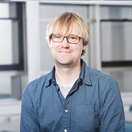 a person standing in front of a building