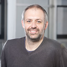 a man smiling for the camera