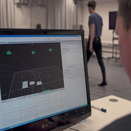 a laptop computer sitting on top of a table