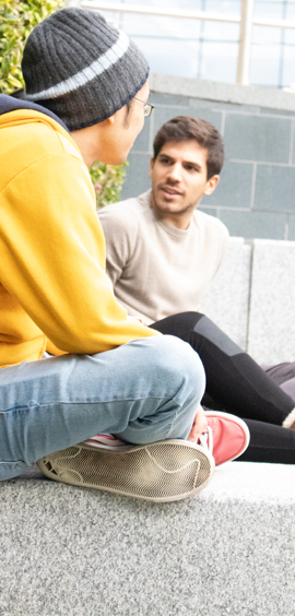 a group of people sitting in chairs
