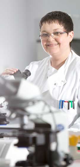 a person standing in a kitchen