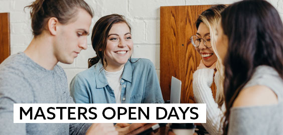 a man and a woman looking at the camera