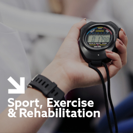 a hand holding a watch