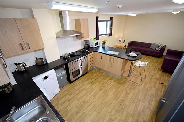 a modern kitchen with stainless steel appliances