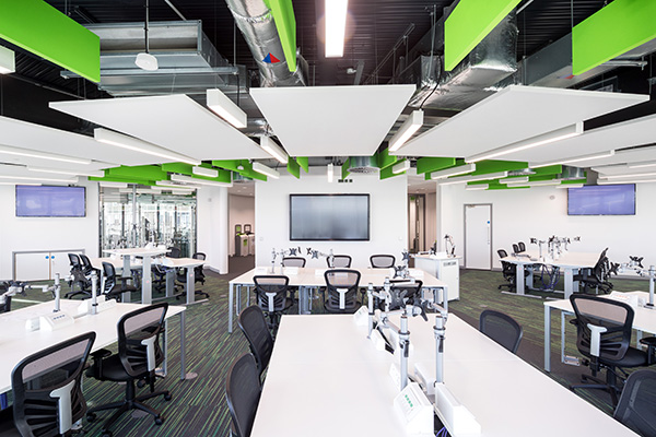 a desk with a computer in an office