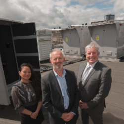 three people smiling