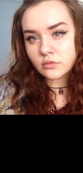 a close up of a woman