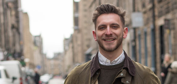 a man wearing a suit and tie