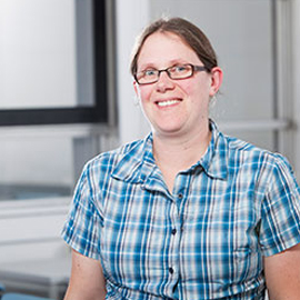 a person standing in front of a window