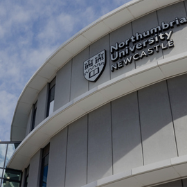 people walking on campus