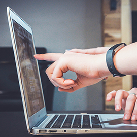 a person using a laptop computer