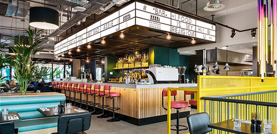 a chair sitting in front of a building