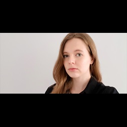 a woman smiling for the camera