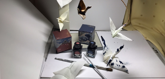 A collection of Japanese objects on a white table