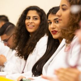 a group of people posing for the camera