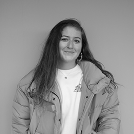 a person standing posing for the camera