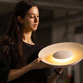 Student examining her work