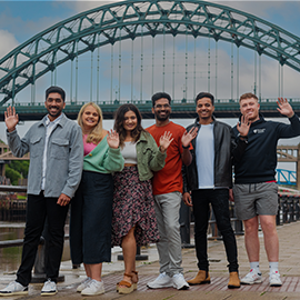 Northumbria SAAB team waving in quayside