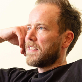 Northumbria alumni Elliot Brook looking into distance