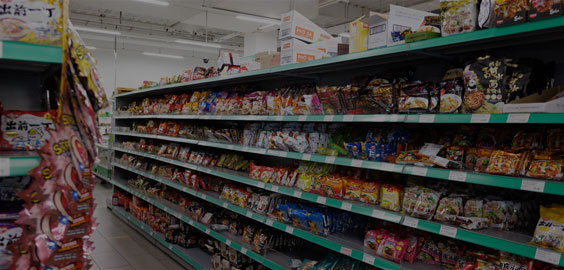 Image of a supermarket aisle and shelves of food products