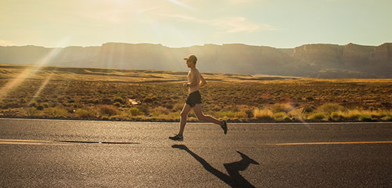 Male running in the desert